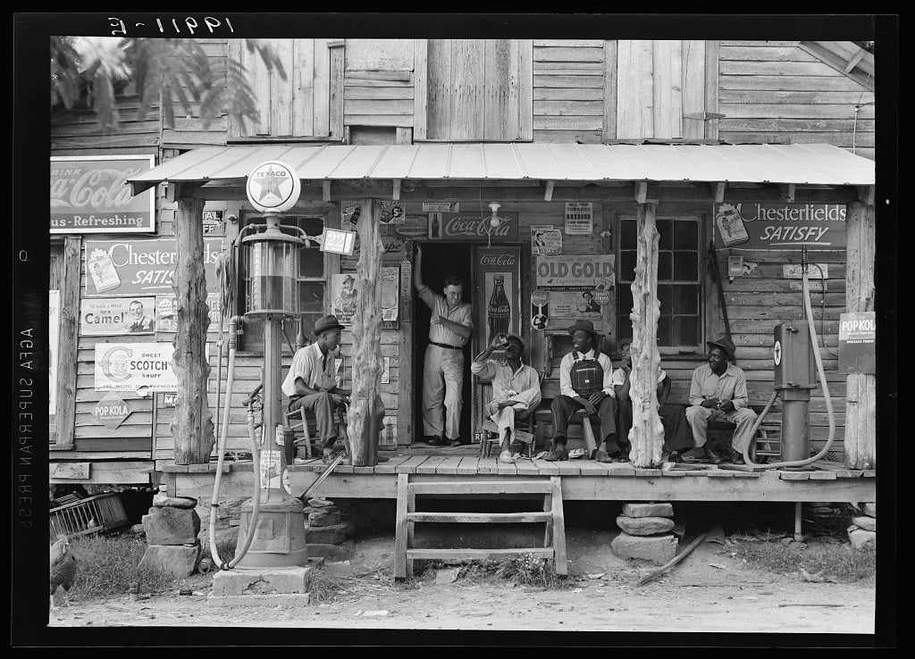 The Crossroads Store — a 1939 country store on a dirt road, Gordonton, North Carolina, photographed by Dorothea Lange