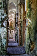 The Long Gallery — a moody stone corridor inside Fort Valledrane