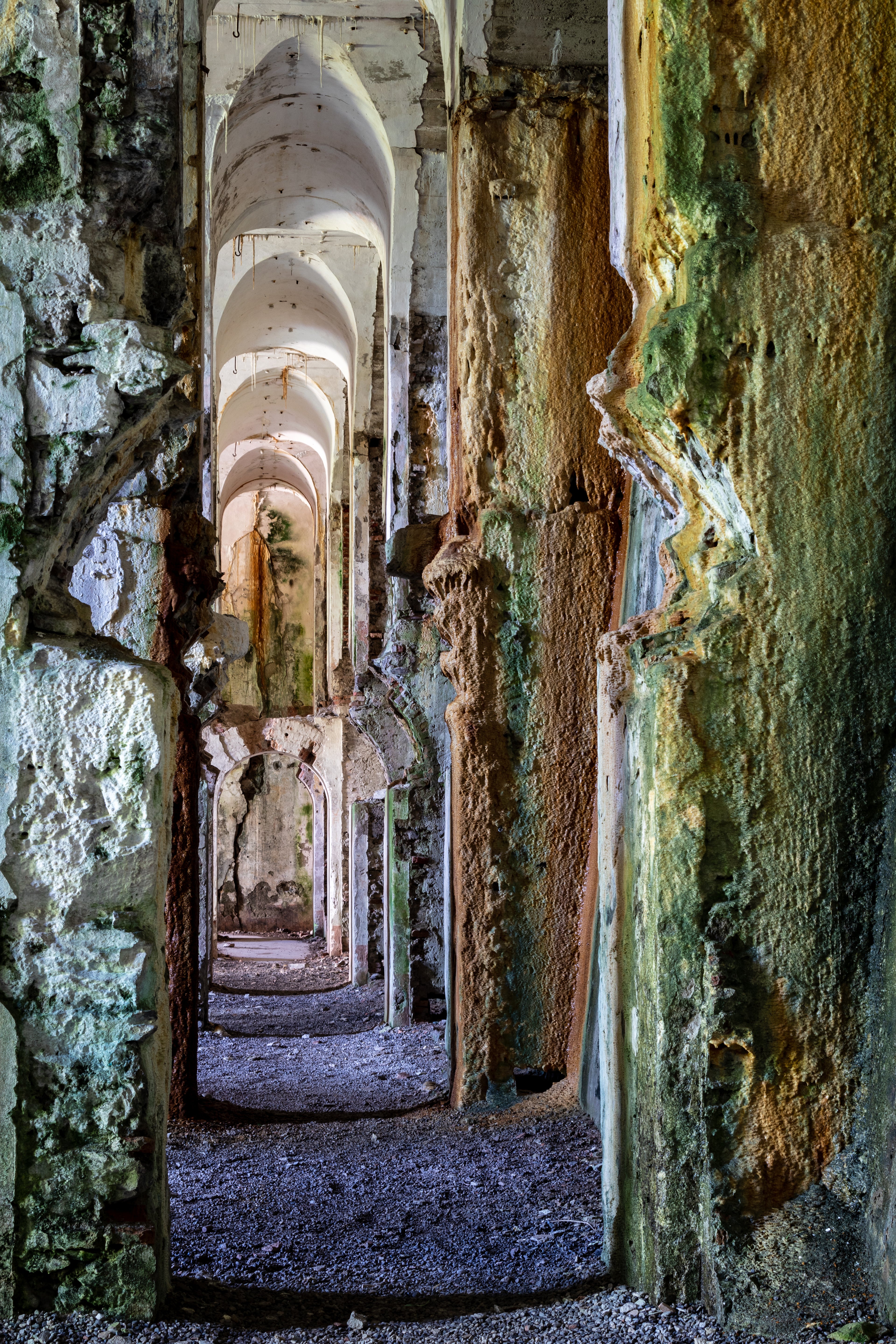 The Long Gallery — a moody stone corridor inside Fort Valledrane