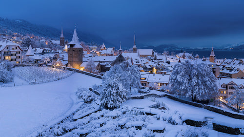 Alpine Hush — the snow-dusted old town of Zug, Switzerland, at blue hour